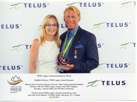 Maxine Davis, Executive Director of the Dr. Peter Centre presented Bradford McIntyre with the PRIDE Legacy Award in the PINK Category: Sexuality - Sexual Health and HIV/AIDS Awareness. July 20, 2013, Vancouver. BC Canada