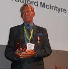 Photo: Bradford McIntyre receiving the PRIDE Legacy Award in the PINK Category: Sexuality - Sexual Health + HIV/AIDS Awareness, July 20, 2013, at the Imperial on Main, PRIDE Legacy Awards presented by TELUS. Vancouver BC