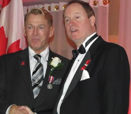 Bradford McIntyre & Dr. Colin Carrie - Bradford McIntyre receives the Queen Elizabeth II Diamond Jubilee Medal for excellence in the field of HIV/AIDS in Canada, on November 27, 2012, Ottawa, Canada.