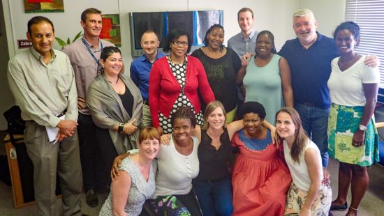 Standing fourth from left, Steven Safren is surrounded by the study team in Khayelelitsha.