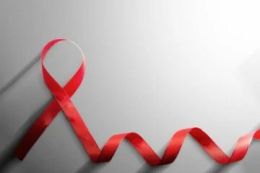 Premium-Photo-Red-ribbon-with-white-background-hiv-aids-ribbon-awareness
