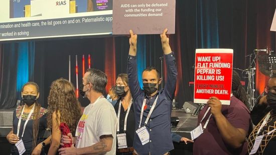 Protestors call for greater investment in HIV at the IAS conference in 2022.