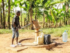 Fred boy at well