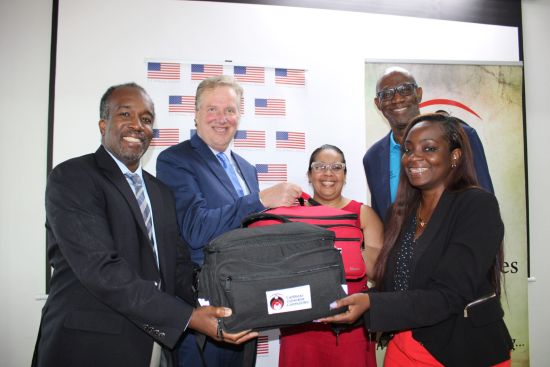 Charg� d�Affaires Scott Renner, representing the U.S. Embassy, together with Dr. Paul Young, Director of the CDC Caribbean Office, formally handed over medical field kits to the CHARES team. This event underscores the ongoing partnership between international health organizations and local healthcar